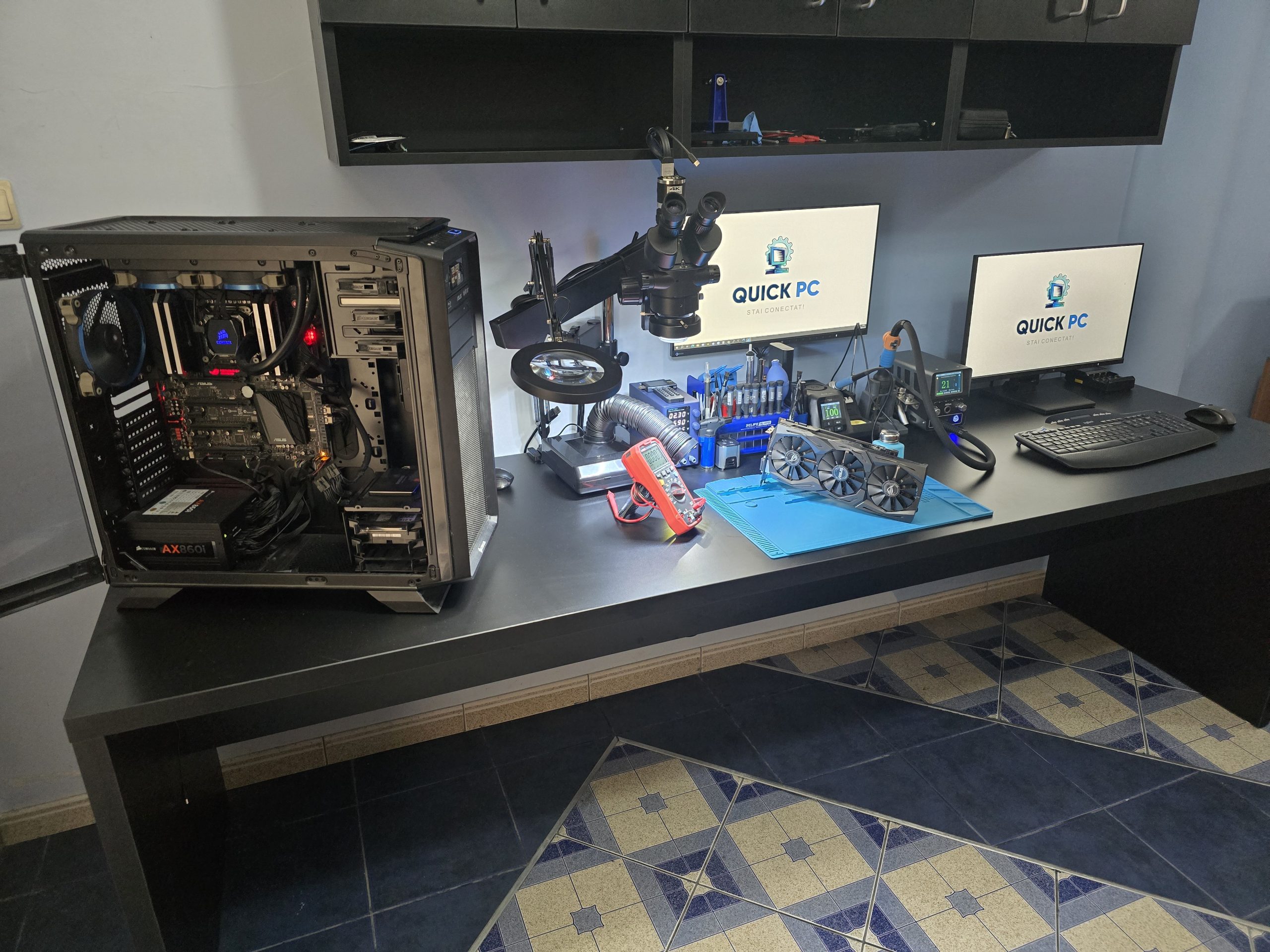 Servicii IT Focșani - atelierul Quick-PC cu microscop trinocular și placă video ASUS ROG